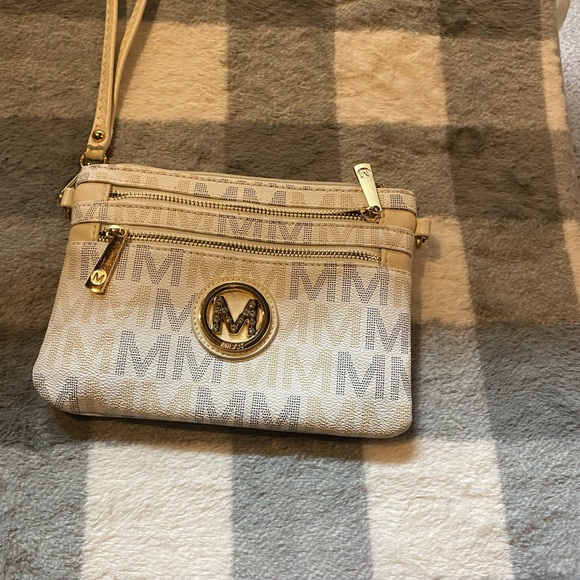 I have a wristlet for sale. - Picture 2 of 2